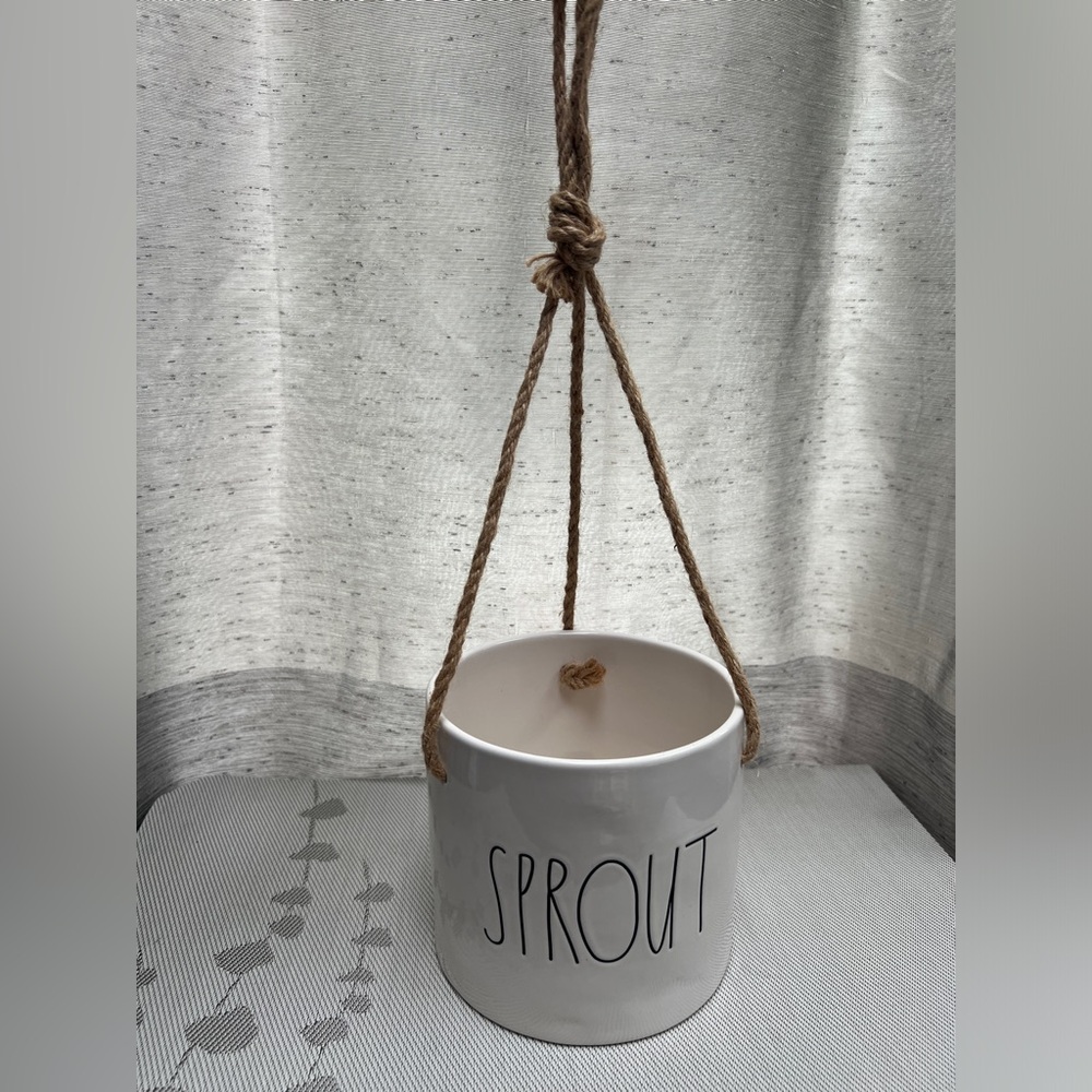 Rae Dunn Hanging Planter 
SPROUT
Approx 5.5”H x 5.75” diameter
New with Tag